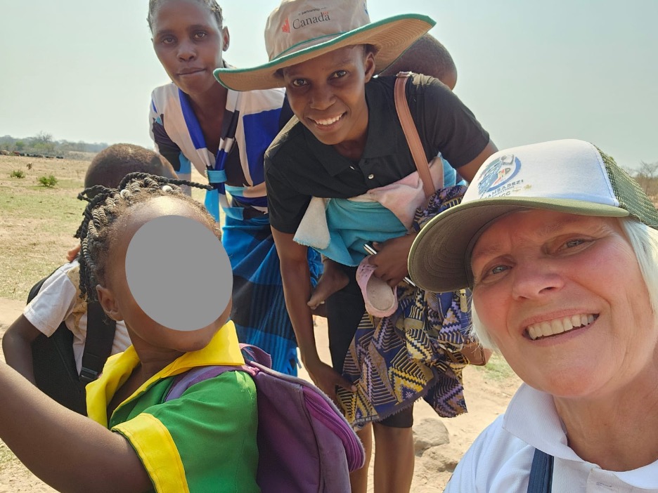 Wendy Kroeker with two women from the Binga district's Saba/Lubanda Ward.
